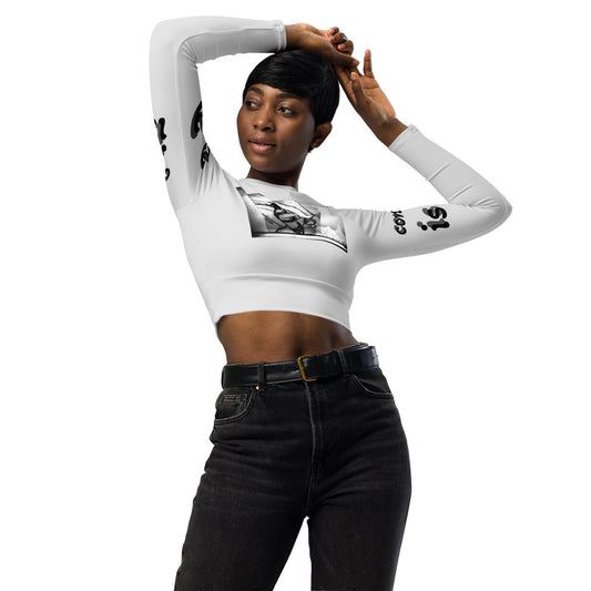 Dieses recycelte Langarm Crop Top mit Allover-Druck besteht aus recyceltem Polyester und Elastan. Dadurch wird es zu einer umweltfreundlichen Wahl für Bade-, Sport- oder Athleisure-Kleidung. Das Crop-Top hat ein abreißbares Pflegeetikett und einen breiten, doppellagigen Bund für eine bequeme Passform. 